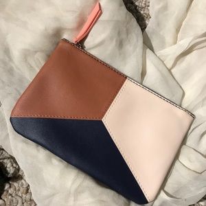 Handheld pouch tricolor pleather